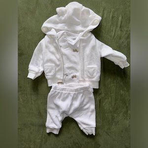 Carter’s White outfit with cow on pants and farm animals on inside r shirt.